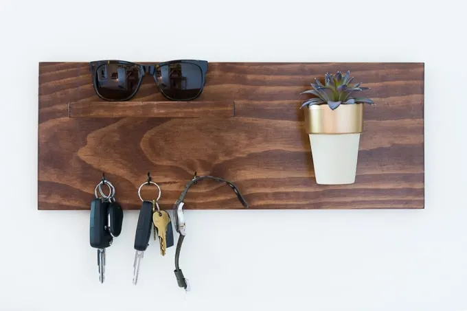 faux succulent hanging on a key rack