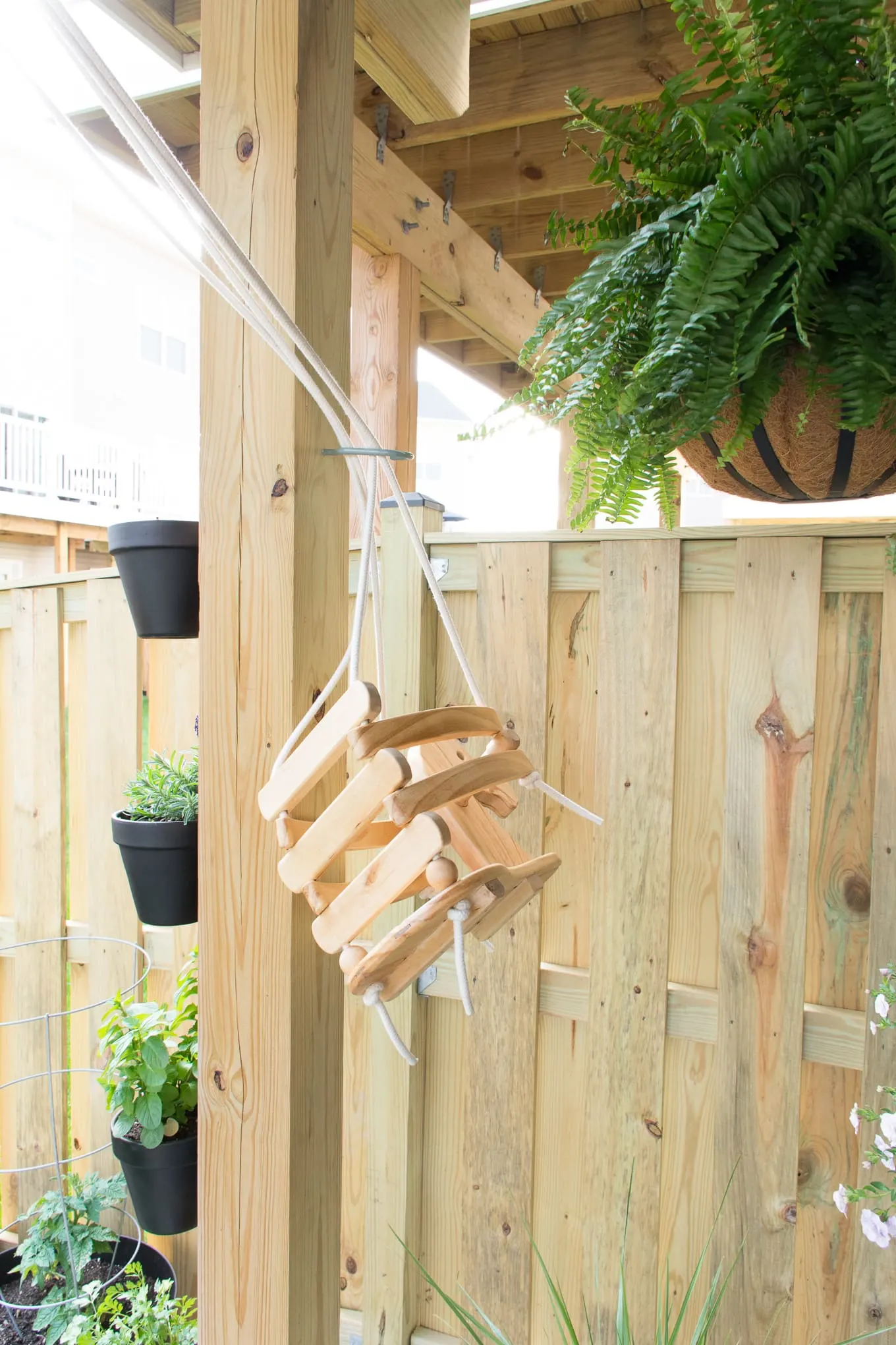 wooden swing for kids in a backyard