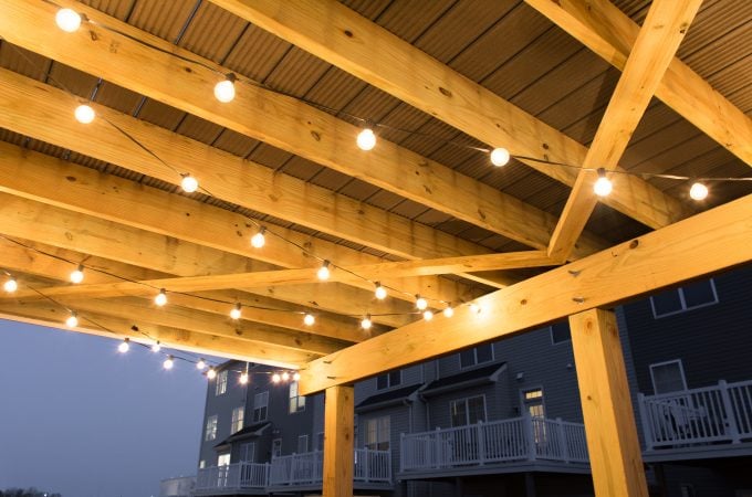 Modern design ideas for a small backyard // hanging globe string lights