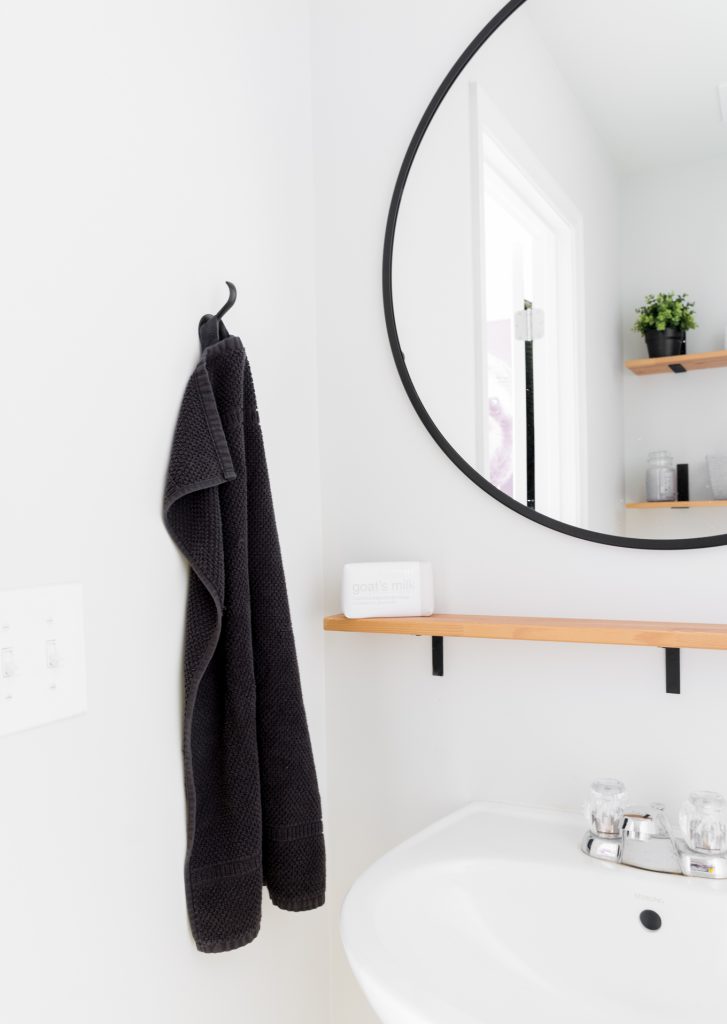 My tiny powder room decorating ideas in our modern half bath!