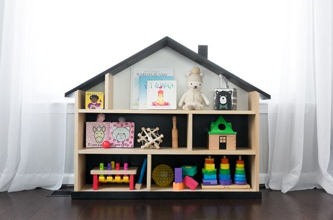 Free build plans to build this stunning DIY modern dollhouse bookcase/DIY dollhouse bookshelf. #diy #buildsomething #dollhouse #dollhousebookcase #diydollhousebookcase #kidsdecor #buildplans #diydollhousebookshelf
