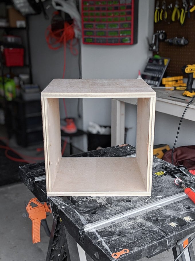 constructing the plywood pieces with glue and screws