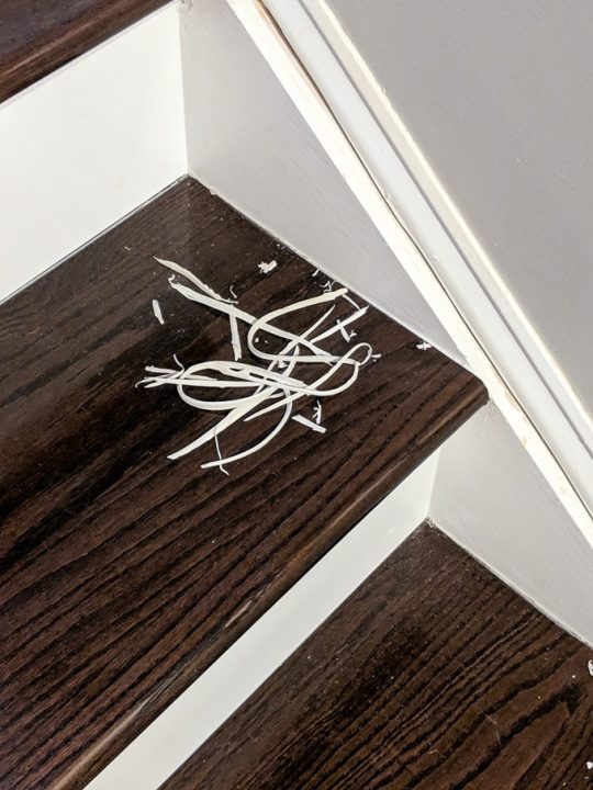 How to Easily Caulk Wood Stairs and Old Cracked Stair Stringers