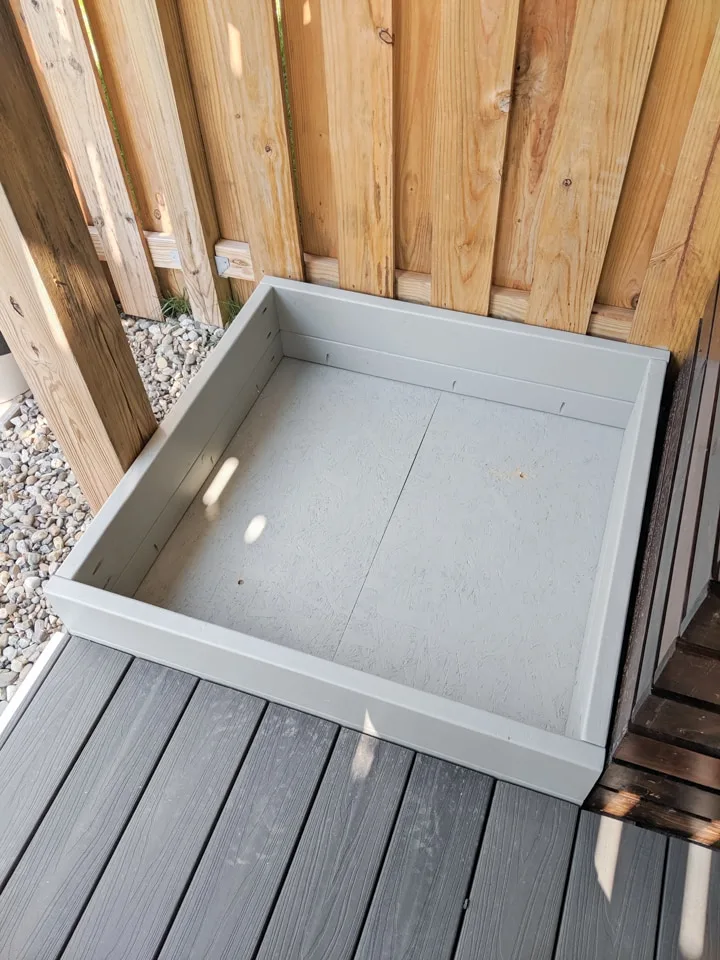 DIY rock box in a townhouse backyard
