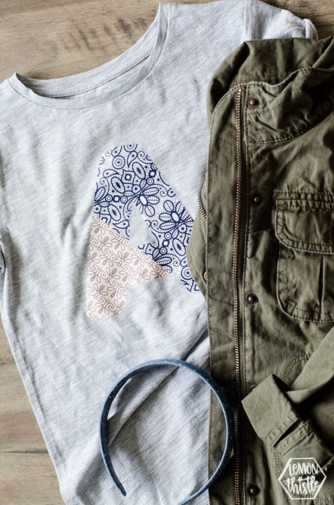 Gray t-shirt with monogrammed letter A in blue and pink made with Cricut