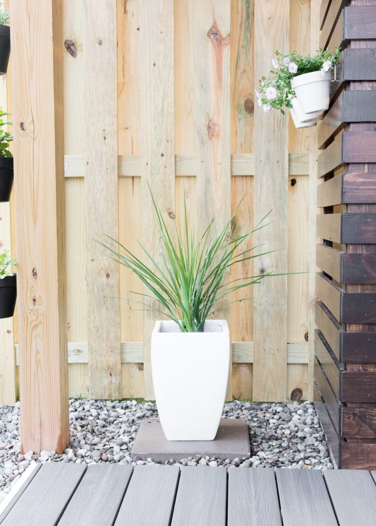 a photo of a painted white pot