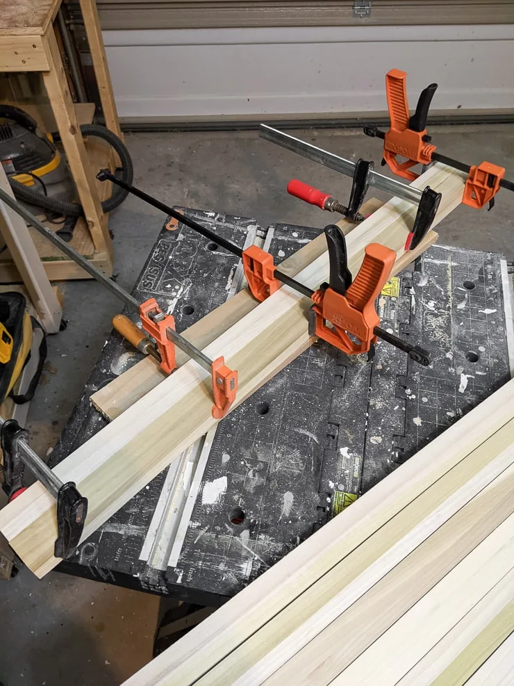 edge gluing boards to create the top of the desk