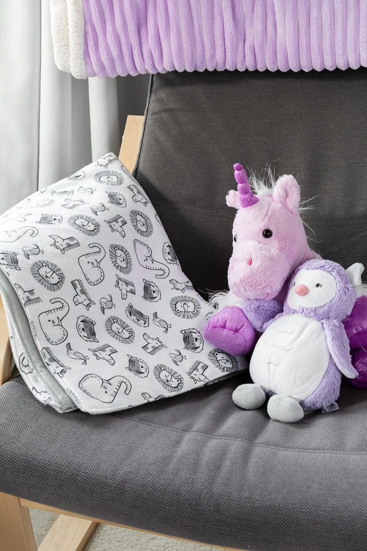easy double-sided baby blanket sewing project on a rocking chair with stuffed animals