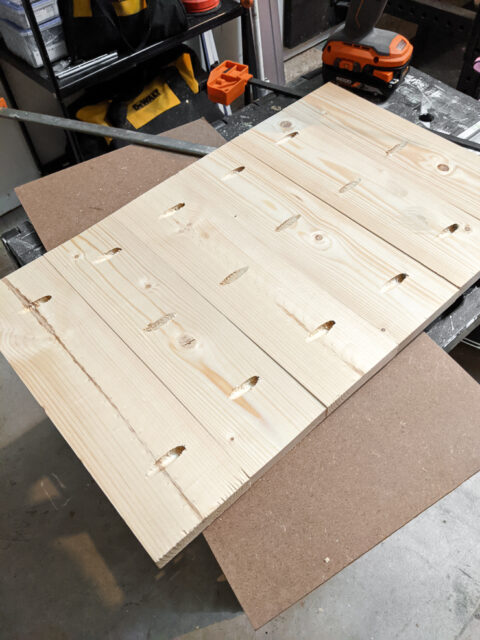 How to make a DIY planter box with hidden hose storage