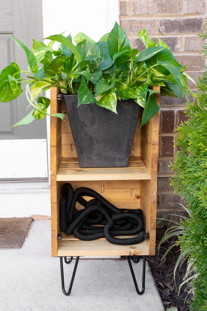 How to make a DIY planter box with hidden hose storage