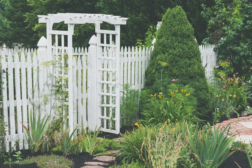 Painted wood picket fence
