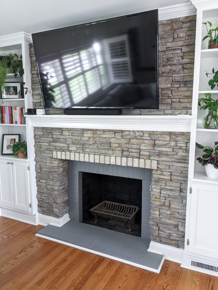 See how I made over an ugly, clunky stone veneer fireplace with paint!