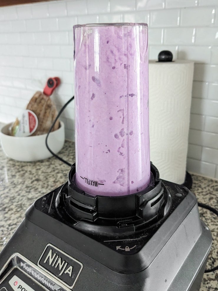 blending wet paper in a blender
