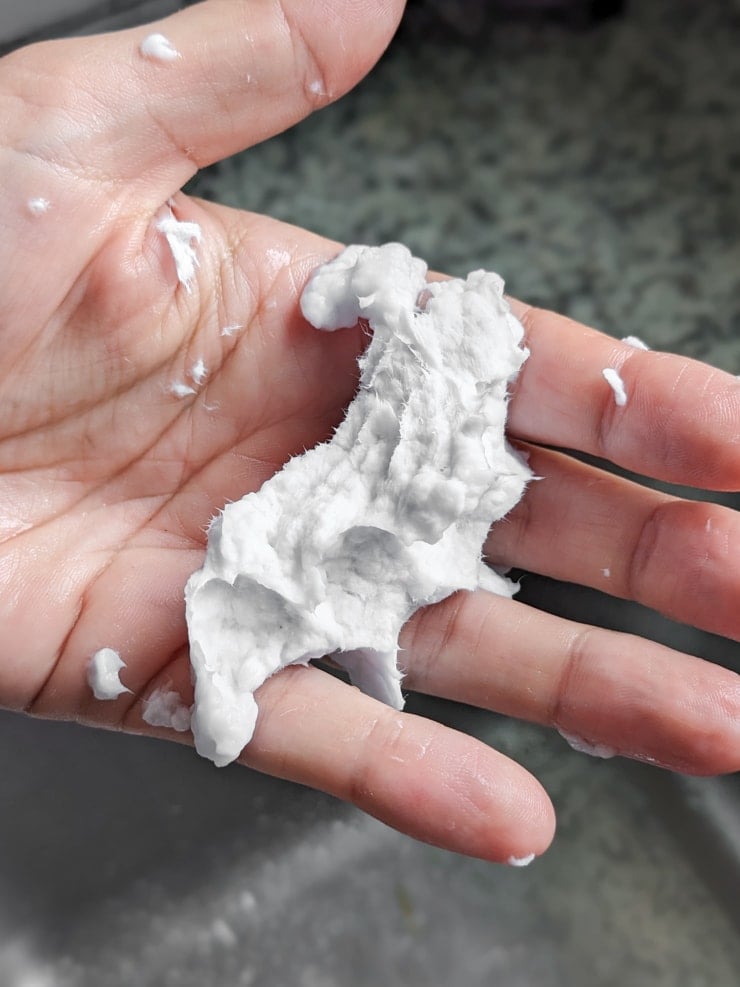 adding seeds to plantable seed paper mix