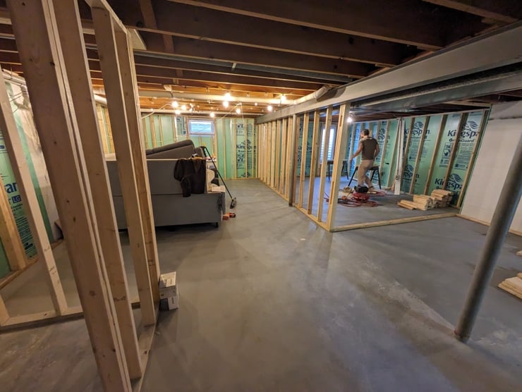 unfinished basement with concrete subfloor