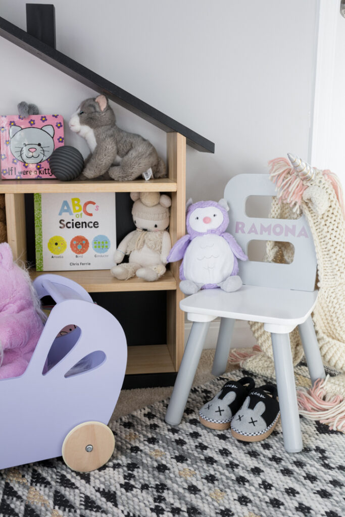 kids chair with a vinyl decal of a name on it
