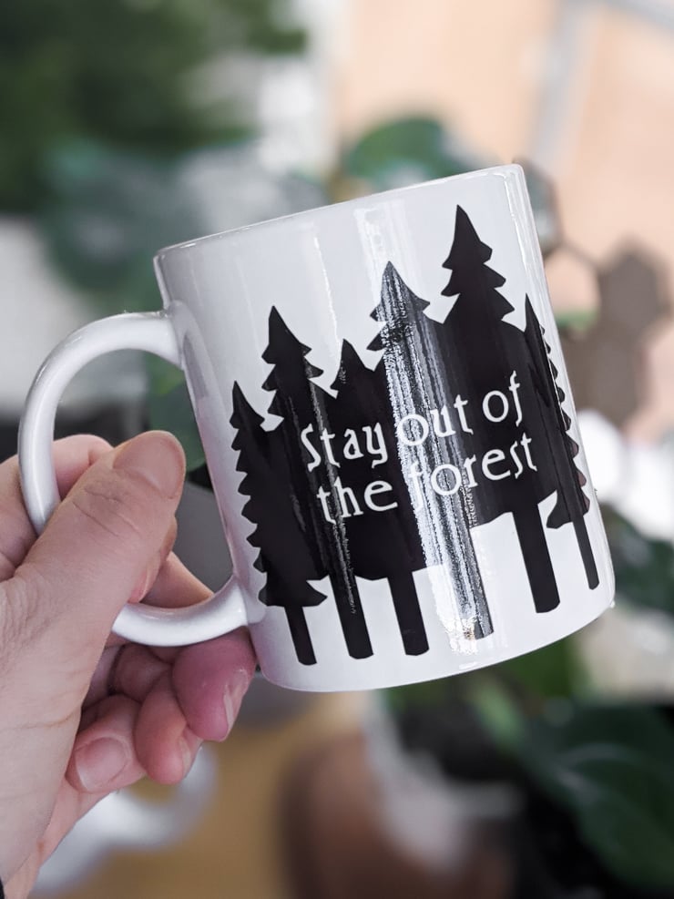 mug that says stay out of the forest
