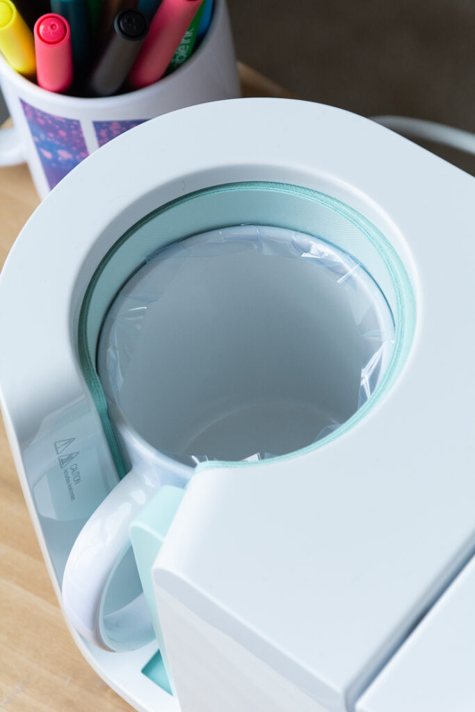 Cricut Mug Press with a mug in it