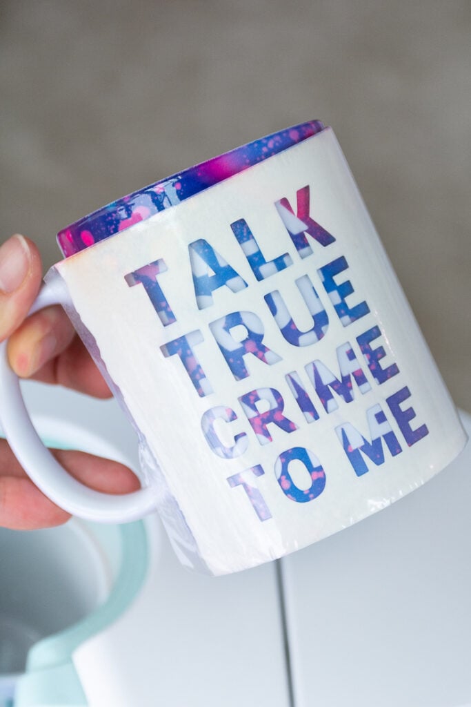 removing an Infusible Ink transfer sheet from a mug