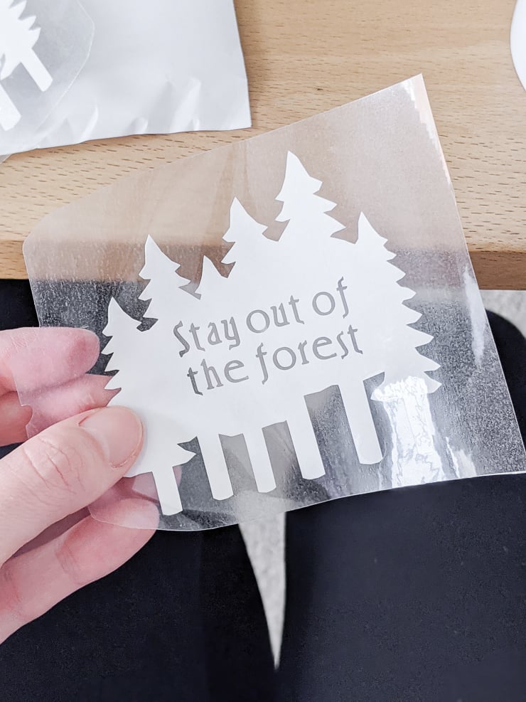 Infusible Ink transfer sheet that says "stay out of the forest"