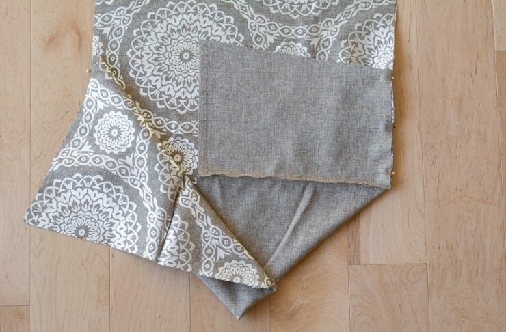 pinning the fabric to hem the bottom